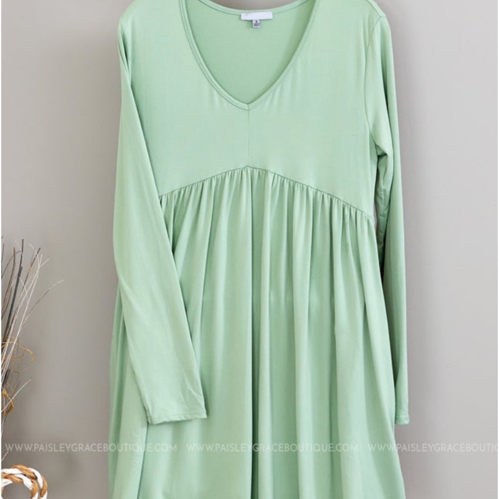 White Birch L/S v-neck dress,empire waist & side pockets.95% POLYESTER 5%SPANDEX